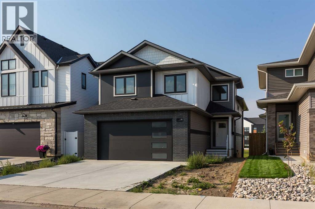 561 Malahat Green W, Lethbridge, Alberta  T1J 5H1 - Photo 2 - A2336904