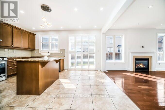 14 Bonnie Braes Drive, Brampton, Ontario  L6Y 0X4 - Photo 8 - W13697308