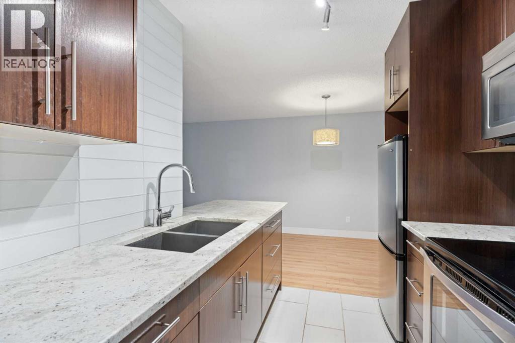 208, 819 4a Street NE, Calgary, Alberta  T2E 3W3 - Photo 16 - A2318335