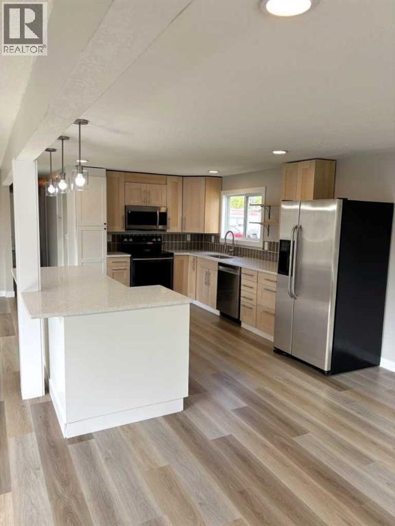 110, 6834 59 Ave Avenue, Red Deer, Alberta  T4P 1C9 - Photo 4 - A2337389