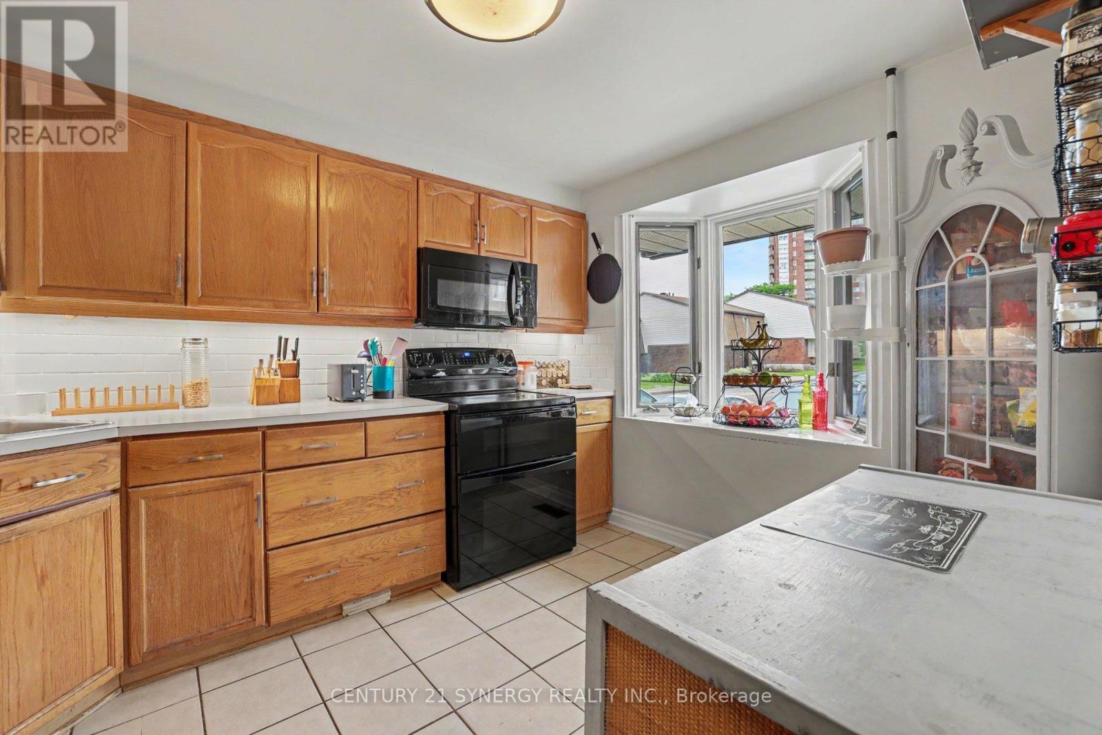 909d Elmsmere Road, Ottawa, Ontario  K1J 8G4 - Photo 6 - X13470734