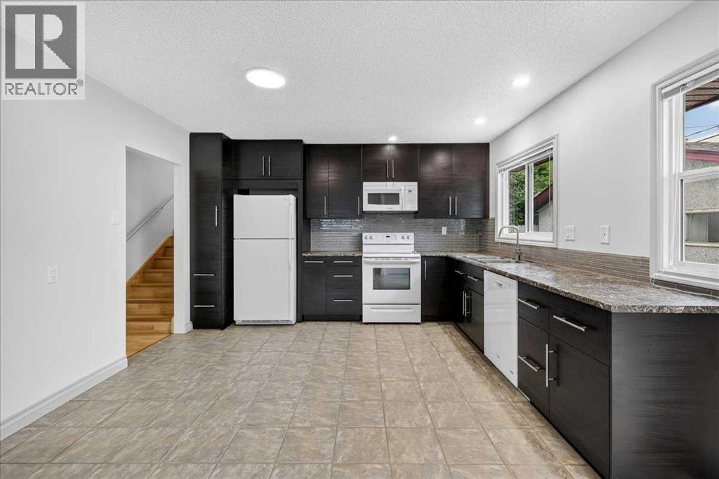 4707 Brockington Road NW, Calgary, Alberta  T2L 1R5 - Photo 9 - A2330736