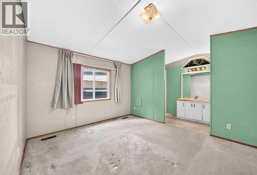 3218 Burroughs Manor NE, Calgary, Alberta  T1Y 6K2 - Photo 19 - A2328136