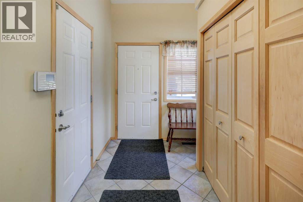 222 Panatella Place NW, Calgary, Alberta  T3K 6C5 - Photo 2 - A2324558