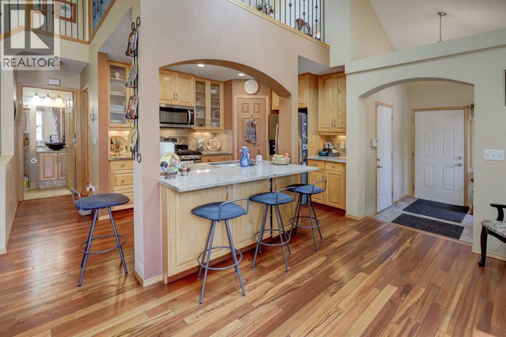 222 Panatella Place NW, Calgary, Alberta  T3K 6C5 - Photo 3 - A2324558