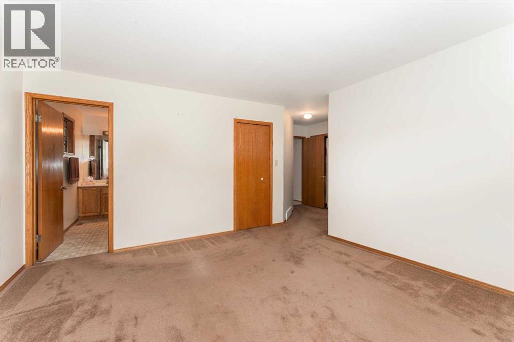 106 Rummel Place, Canmore, Alberta  T1W 2N4 - Photo 24 - A2338337