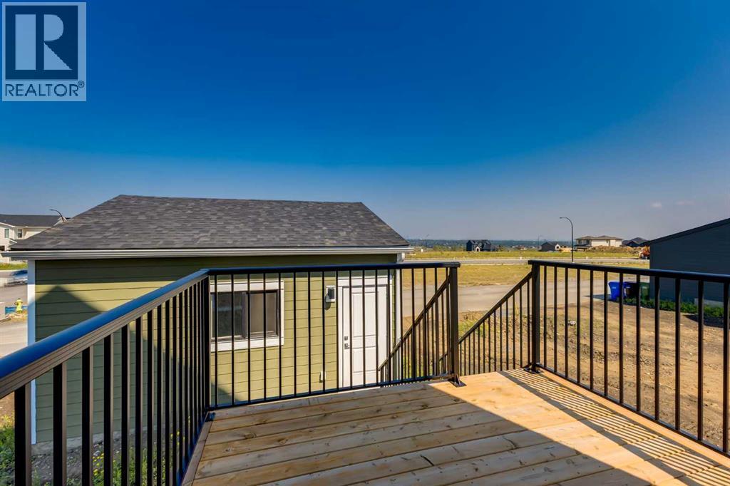 87 Bluerock Terrace SW, Calgary, Alberta  T2Y 0Y3 - Photo 48 - A2322934