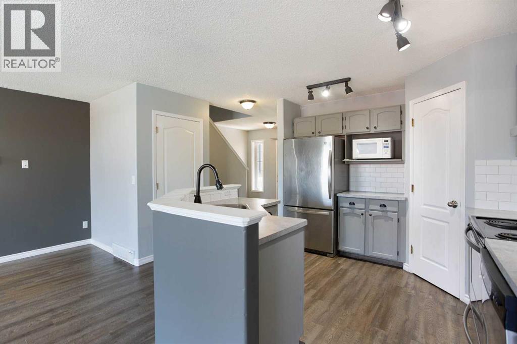 7269 Laguna Way Ne, Calgary, Alberta  T1Y 7C9 - Photo 5 - A2337727
