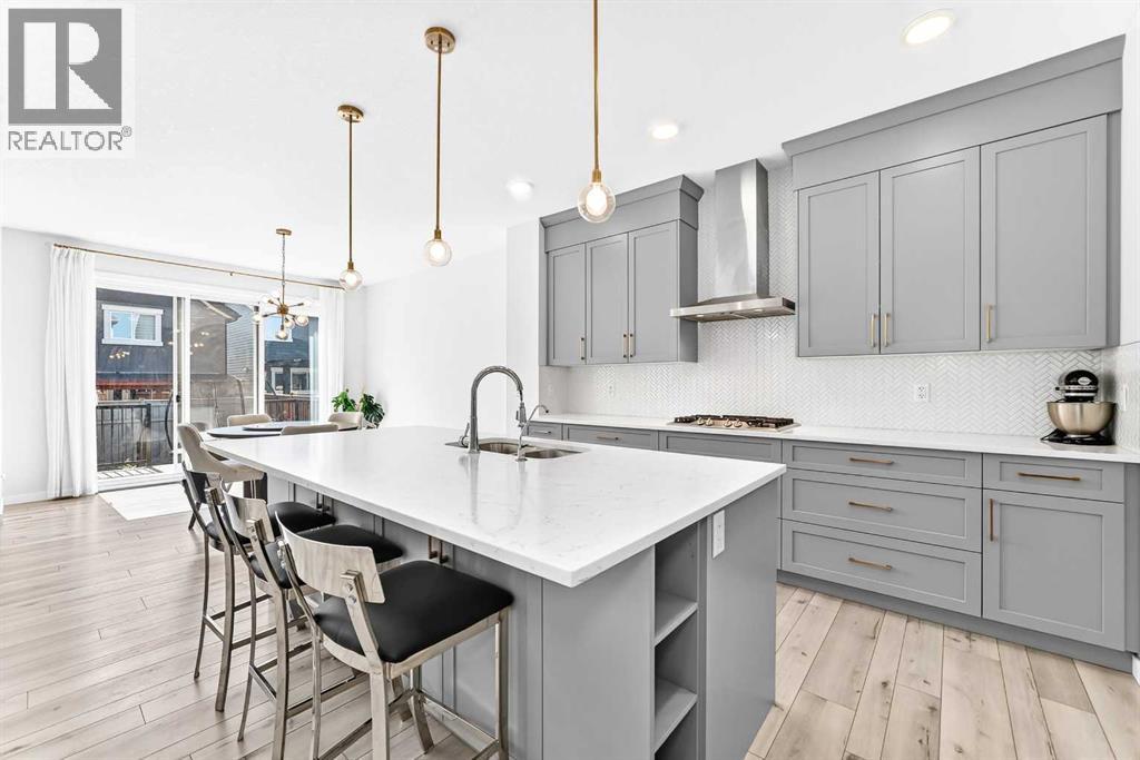 105 Magnolia Manor Se, Calgary, Alberta  T3M 3H8 - Photo 3 - A2338426
