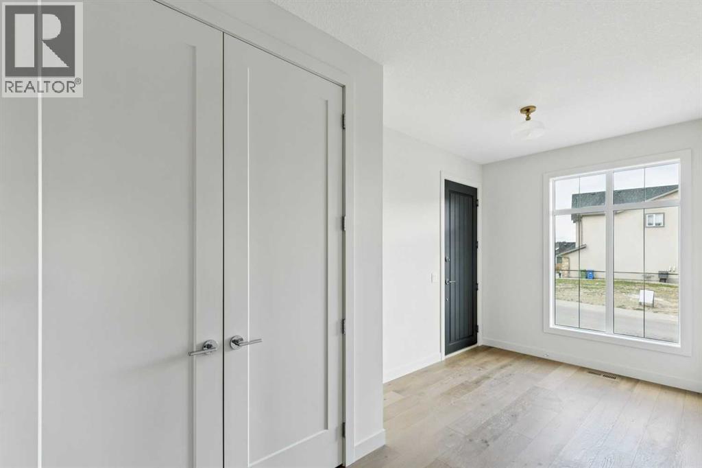 2 Rock Lake View NW, Calgary, Alberta  T3G 0G1 - Photo 4 - A2315261