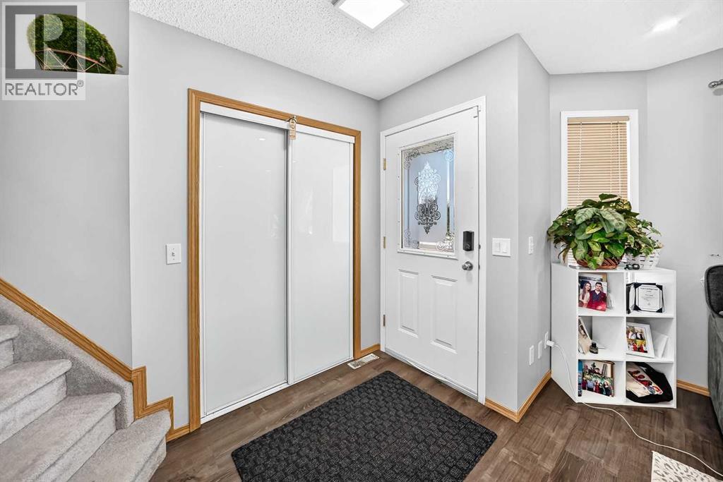 205 Hidden Hills Place NW, Calgary, Alberta  T3A 6E3 - Photo 4 - A2324116