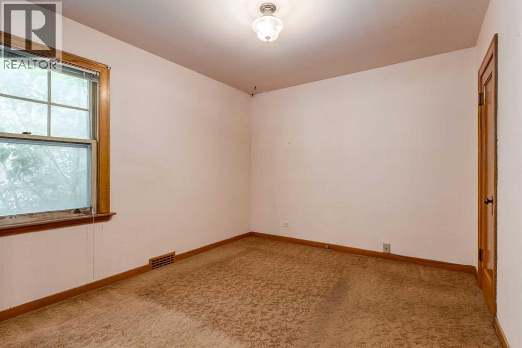 1409 8 Street NW, Calgary, Alberta  T2M 3K4 - Photo 11 - A2338823