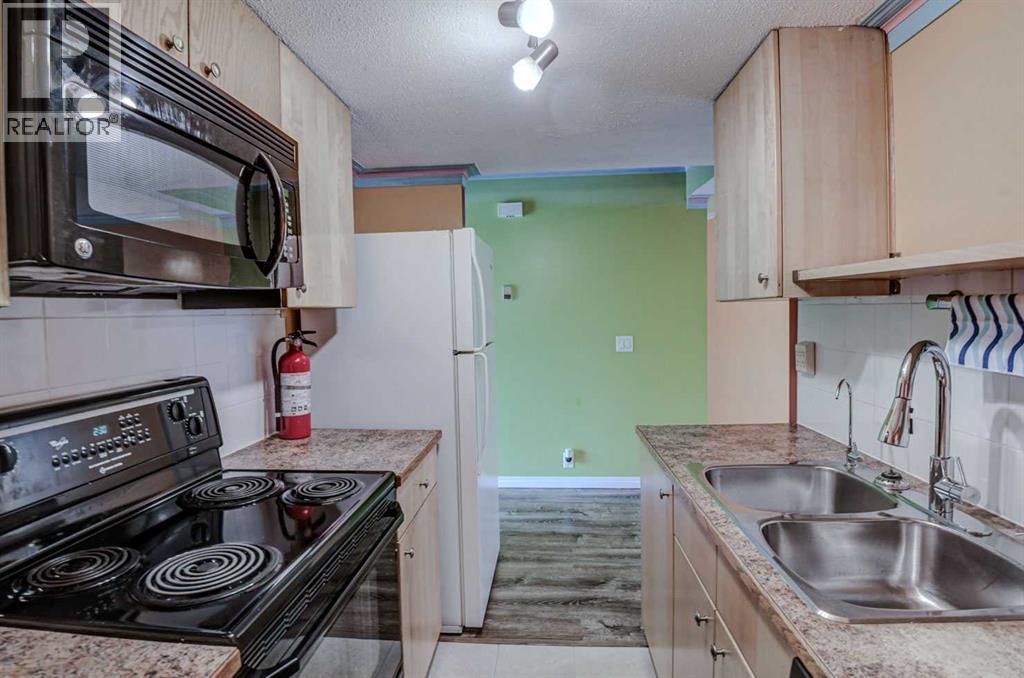 56, 1055 72 Avenue NW, Calgary, Alberta T2K 5S4 - Photo 8 - A2326321