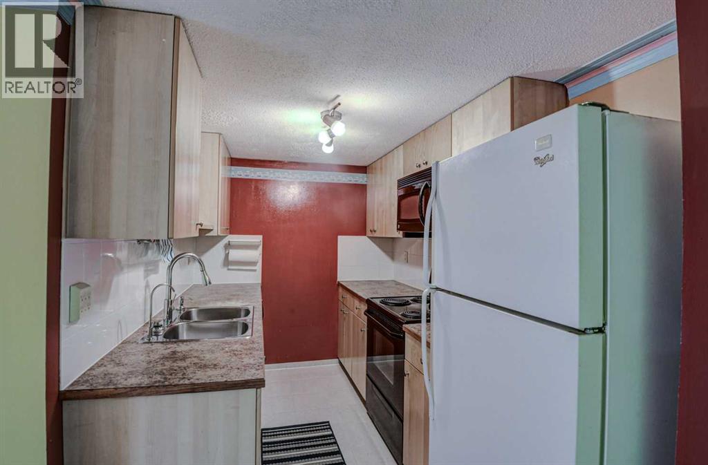 56, 1055 72 Avenue NW, Calgary, Alberta T2K 5S4 - Photo 6 - A2326321