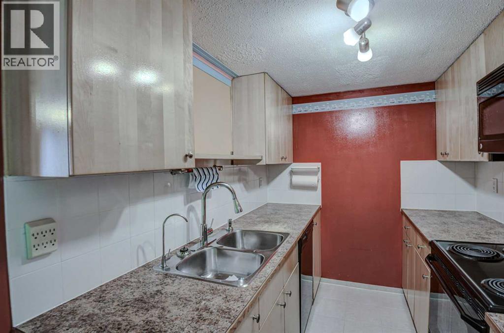 56, 1055 72 Avenue NW, Calgary, Alberta T2K 5S4 - Photo 7 - A2326321