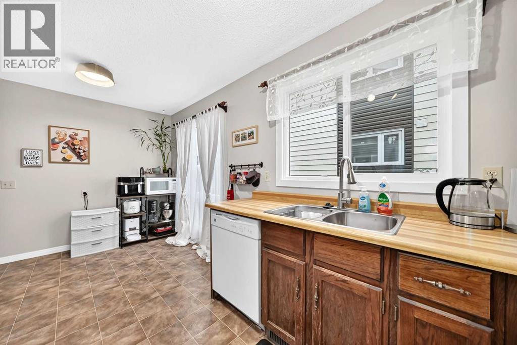 1487 Berkley Drive NW, Calgary, Alberta  T3K 1T7 - Photo 16 - A2337862