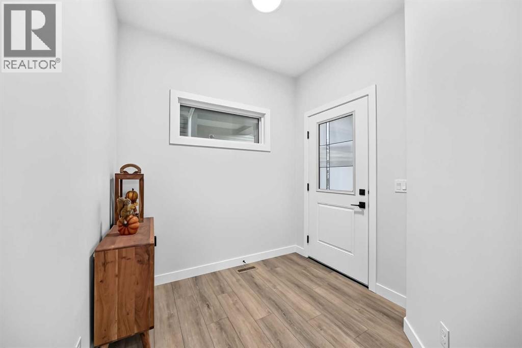 118 Ambleside Heath NW, Calgary, Alberta  T3P 1S4 - Photo 3 - A2322242
