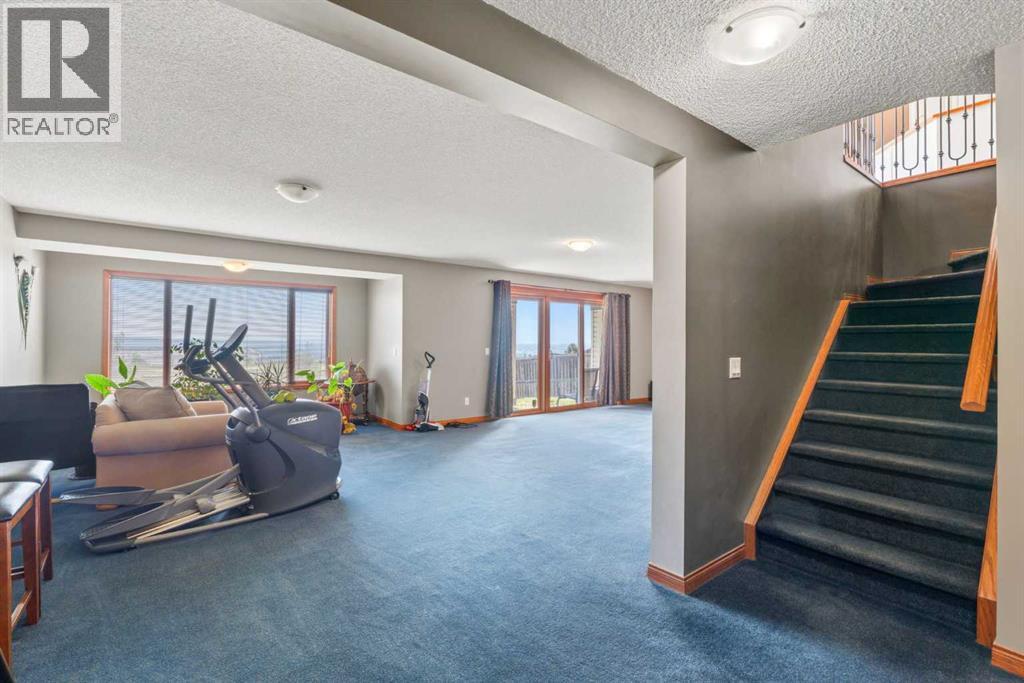 215 Rocky Ridge Drive NW, Calgary, Alberta  T3G 4M1 - Photo 24 - A2338299