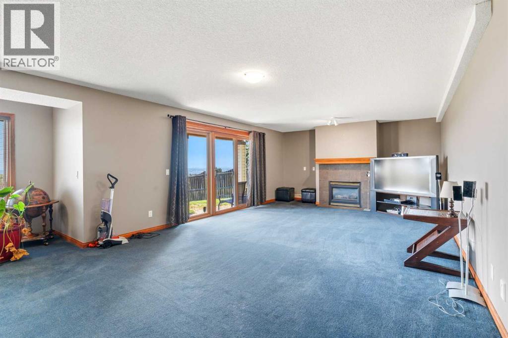 215 Rocky Ridge Drive NW, Calgary, Alberta  T3G 4M1 - Photo 25 - A2338299