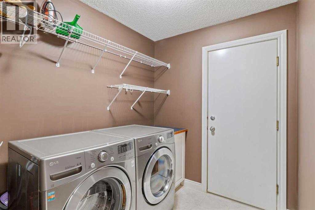 215 Rocky Ridge Drive NW, Calgary, Alberta  T3G 4M1 - Photo 17 - A2338299