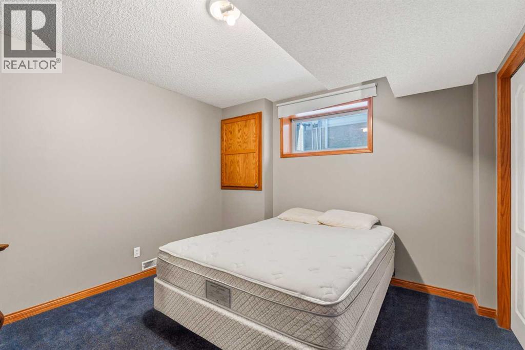 215 Rocky Ridge Drive NW, Calgary, Alberta  T3G 4M1 - Photo 27 - A2338299