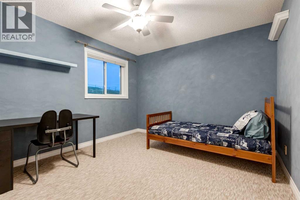 331 Sierra Madre Court SW, Calgary, Alberta  T3H 3G7 - Photo 25 - A2338758