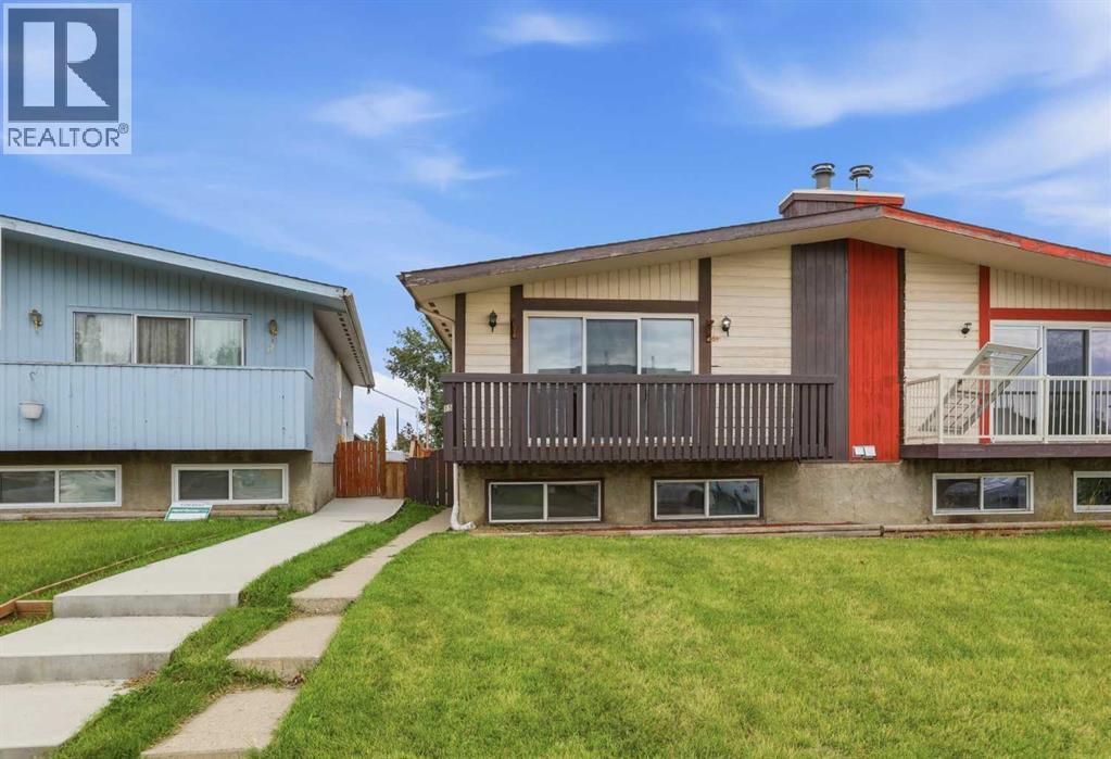 15 Doverville Way SE, Calgary, Alberta  T2B 2N6 - Photo 1 - A2338609