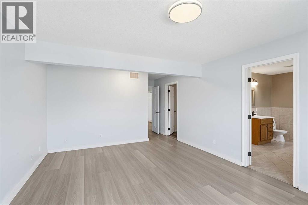 167 Harvest Glen Way NE, Calgary, Alberta  T3K 4J4 - Photo 18 - A2337945