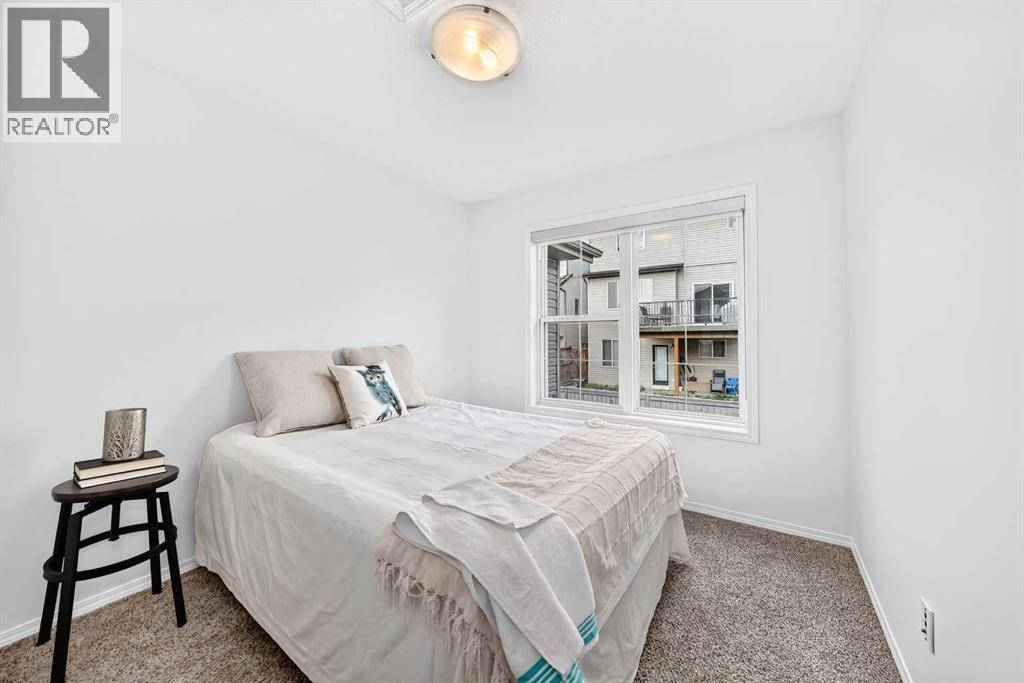 203, 70 Panatella Landing NW, Calgary, Alberta  T3K 0K2 - Photo 17 - A2337947