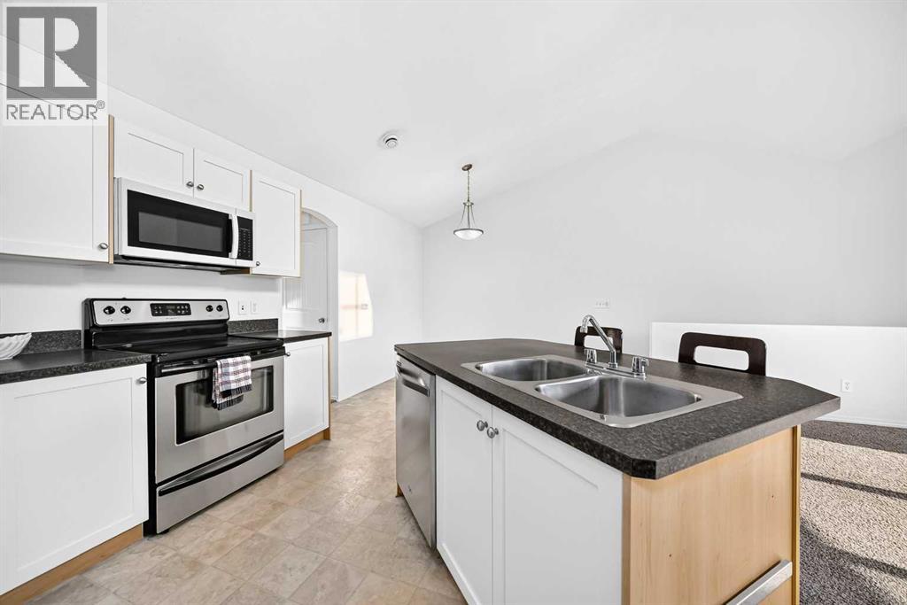 203, 70 Panatella Landing NW, Calgary, Alberta  T3K 0K2 - Photo 4 - A2337947