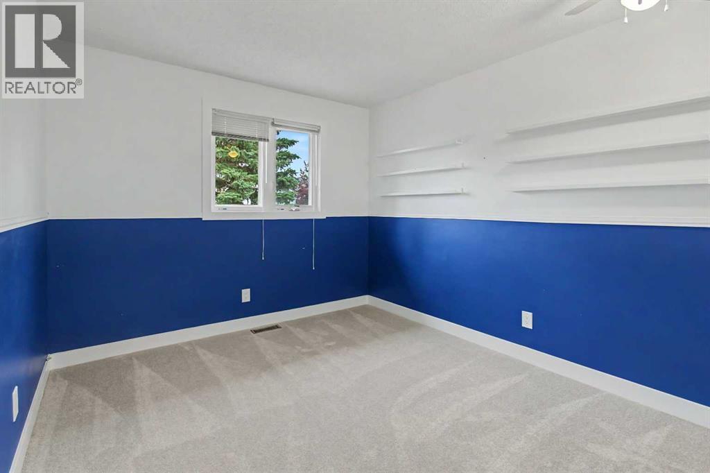61 Wood Valley Road SW, Calgary, Alberta  T2W 5Y6 - Photo 28 - A2336262