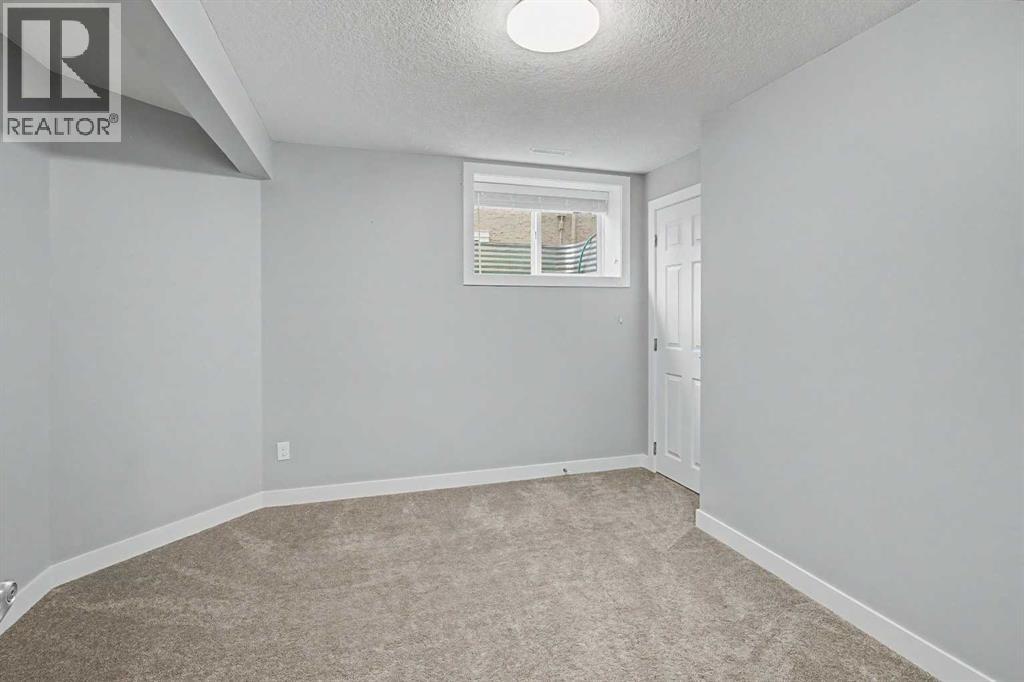 61 Wood Valley Road SW, Calgary, Alberta  T2W 5Y6 - Photo 35 - A2336262