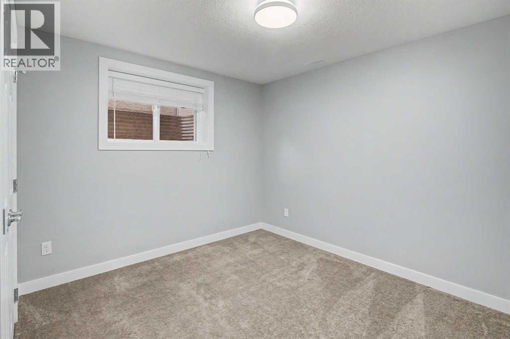 61 Wood Valley Road SW, Calgary, Alberta  T2W 5Y6 - Photo 33 - A2336262