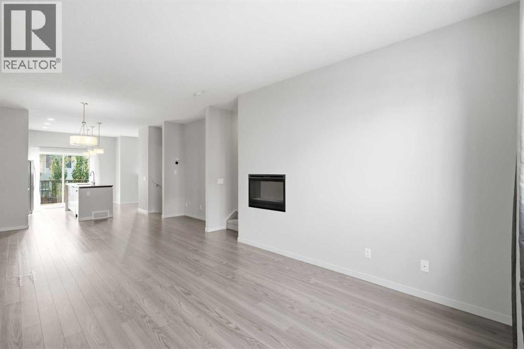 209 Copperpond Row SE, Calgary, Alberta  T2Z 1H2 - Photo 9 - A2339069
