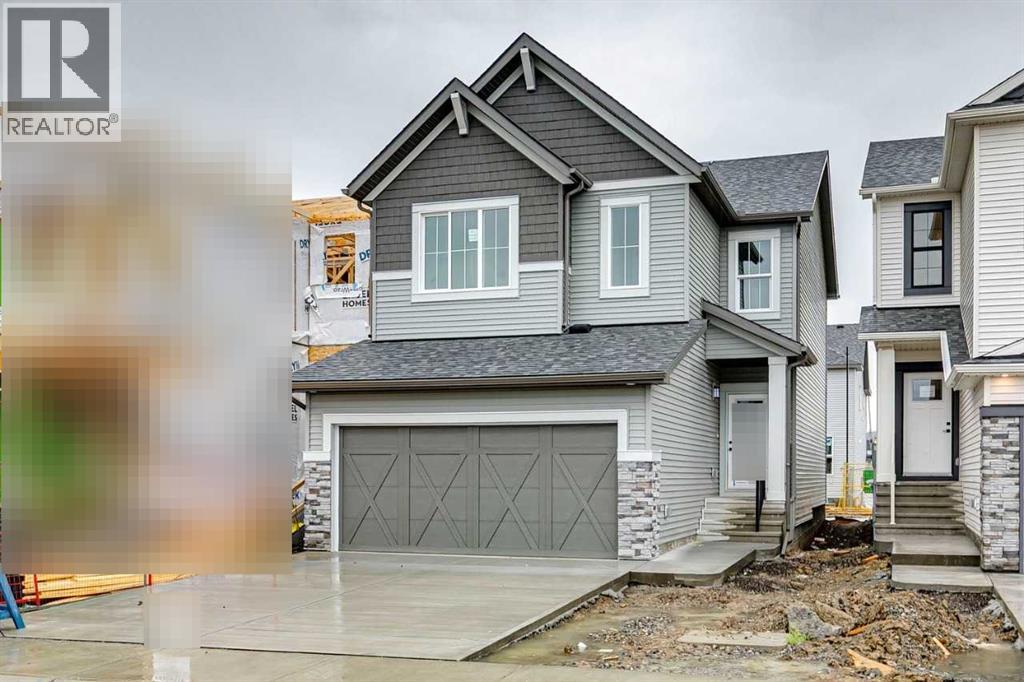 109 Creekstone Place SW, Calgary, Alberta  T2X 4Y3 - Photo 1 - A2290725