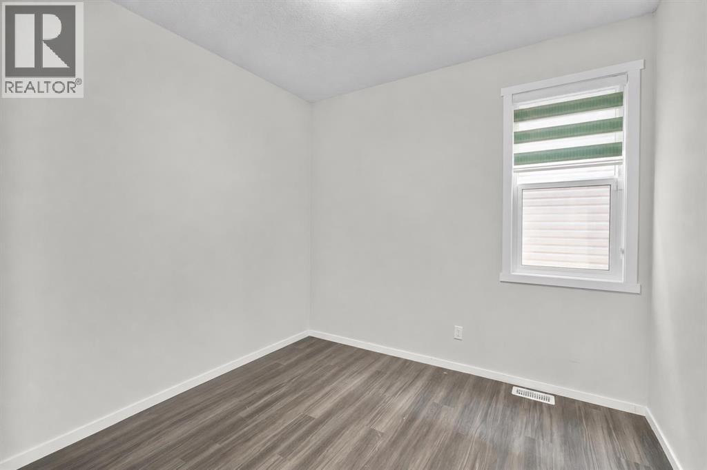 243 Savanna Lane NE, Calgary, Alberta  T3J 0Y9 - Photo 5 - A2338286