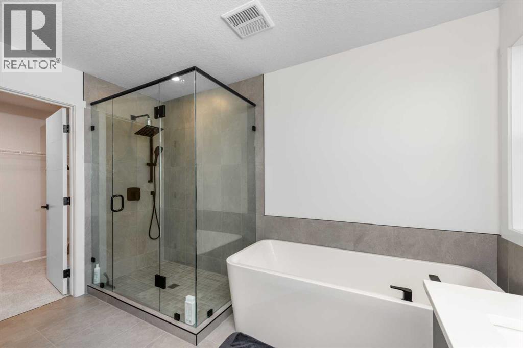 124 Heritage Boulevard, Cochrane, Alberta  T4C 3G8 - Photo 19 - A2338531