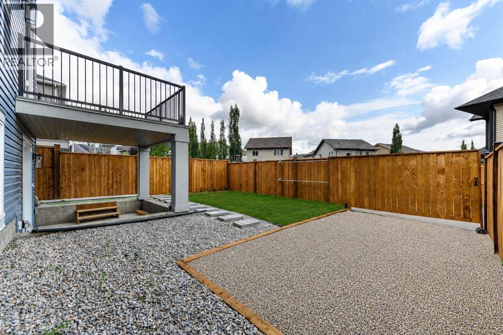 124 Heritage Boulevard, Cochrane, Alberta  T4C 3G8 - Photo 37 - A2338531