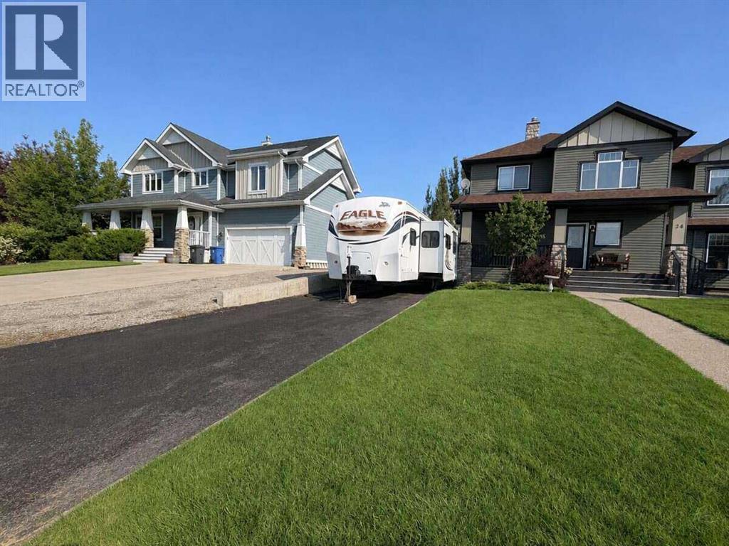 24 Brander Avenue NW, Langdon, Alberta  T0J 1X2 - Photo 39 - A2334594