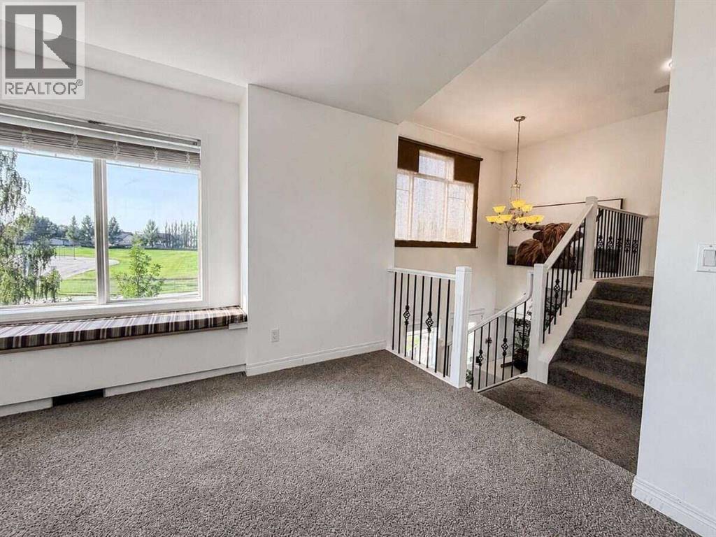 24 Brander Avenue NW, Langdon, Alberta  T0J 1X2 - Photo 32 - A2334594