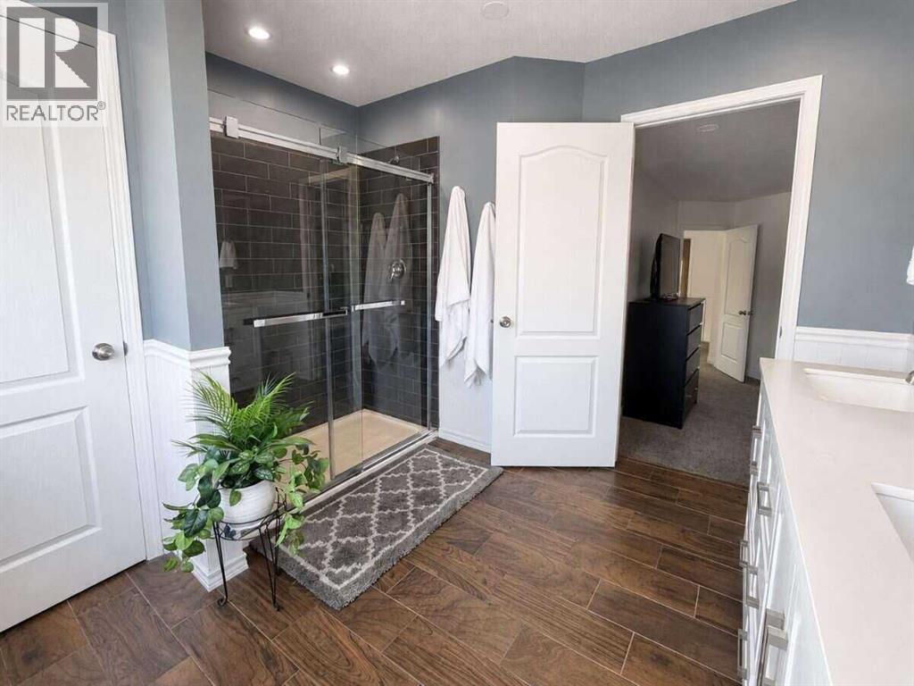 24 Brander Avenue NW, Langdon, Alberta  T0J 1X2 - Photo 23 - A2334594