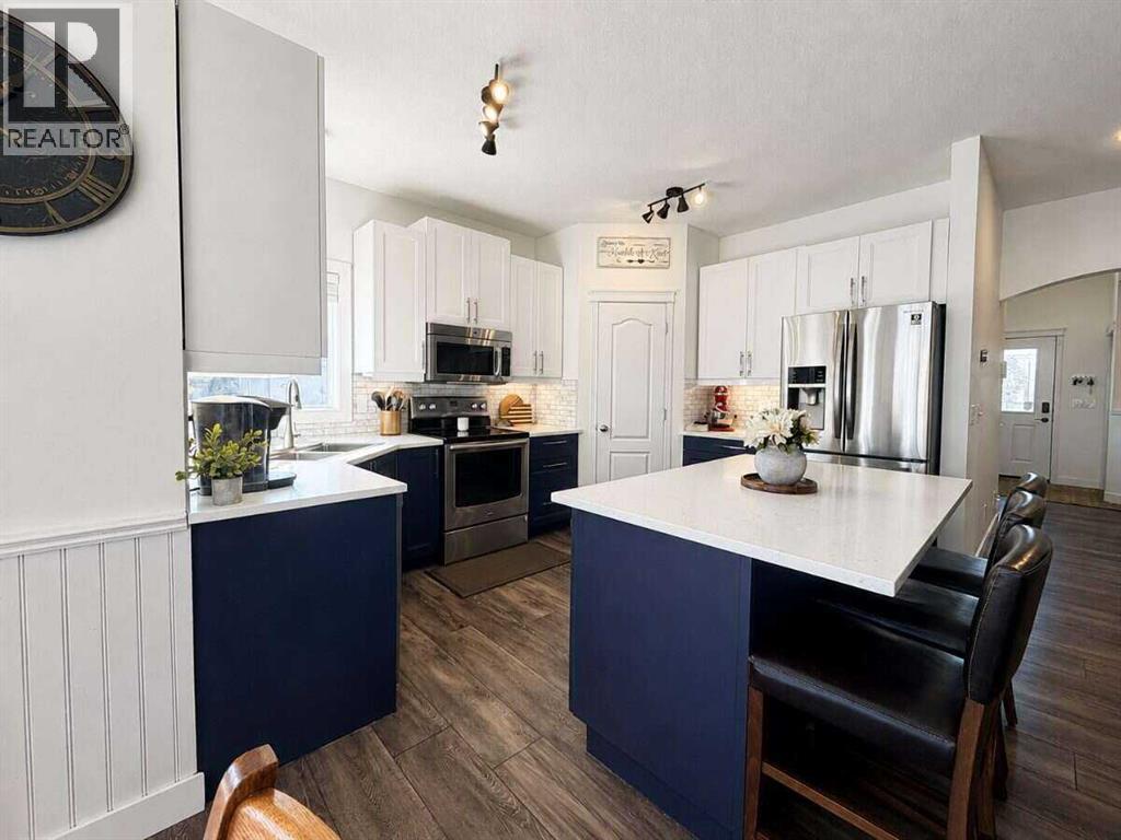 24 Brander Avenue NW, Langdon, Alberta  T0J 1X2 - Photo 11 - A2334594