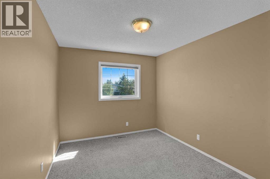 62 West Mitford Crescent, Cochrane, Alberta  T4C 1L2 - Photo 36 - A2338724