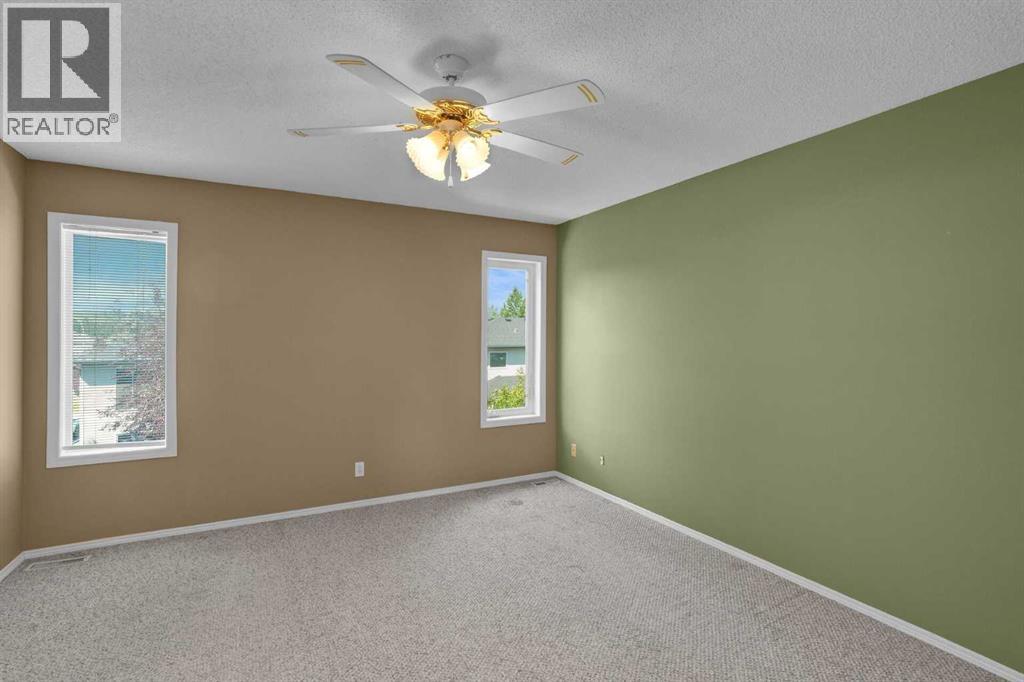62 West Mitford Crescent, Cochrane, Alberta  T4C 1L2 - Photo 38 - A2338724