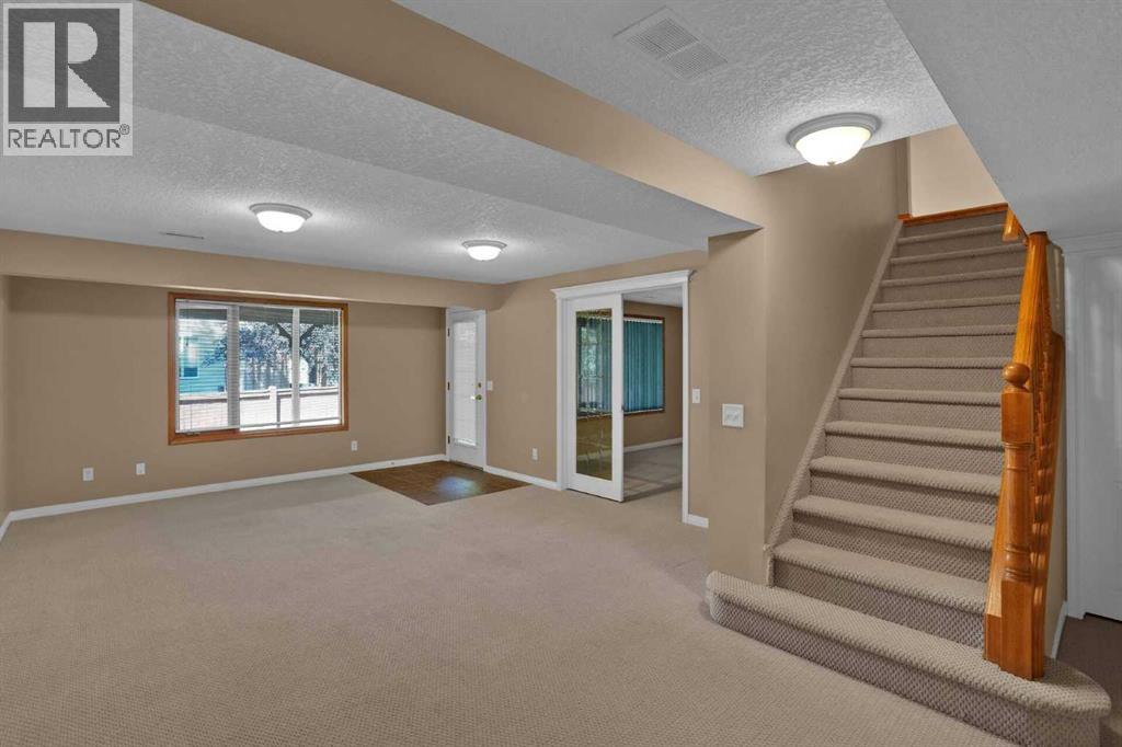 62 West Mitford Crescent, Cochrane, Alberta  T4C 1L2 - Photo 42 - A2338724