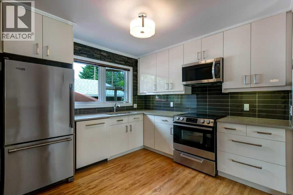 48 Hillary Crescent SW, Calgary, Alberta  T2V 3J2 - Photo 8 - A2334540
