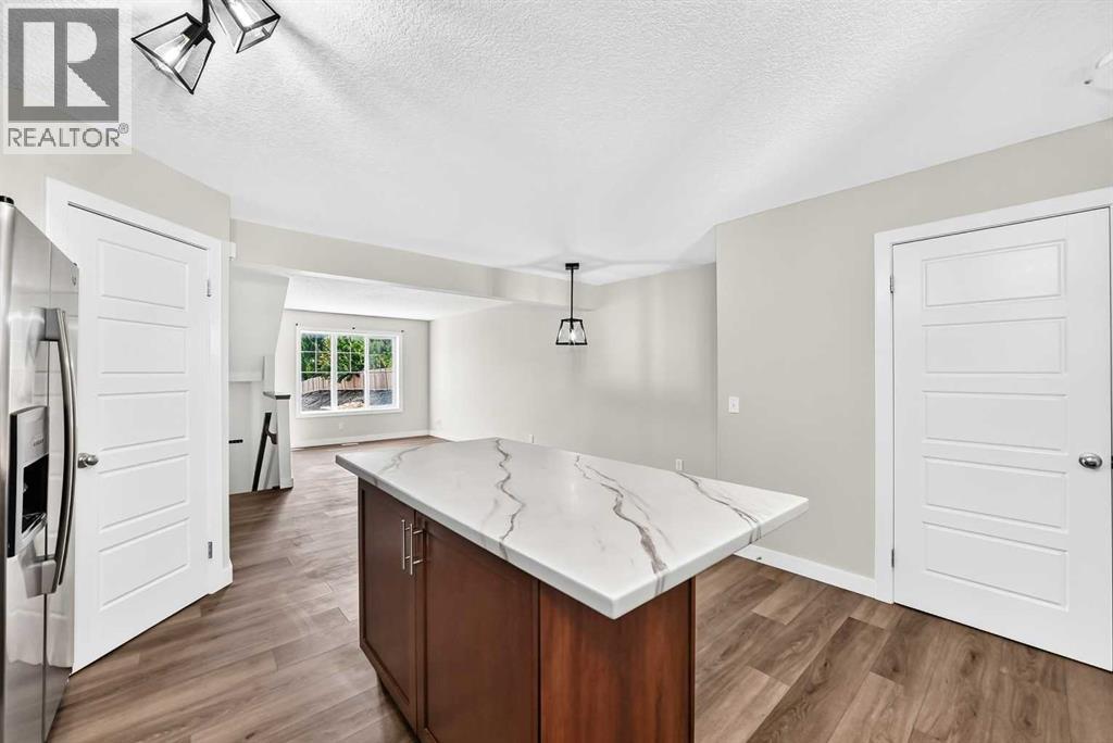 86 Pantego Lane NW, Calgary, Alberta  T3K 0T1 - Photo 9 - A2338242