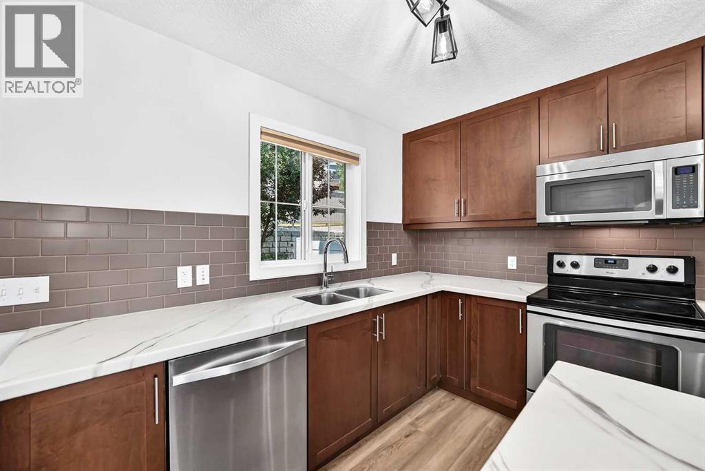86 Pantego Lane NW, Calgary, Alberta  T3K 0T1 - Photo 11 - A2338242