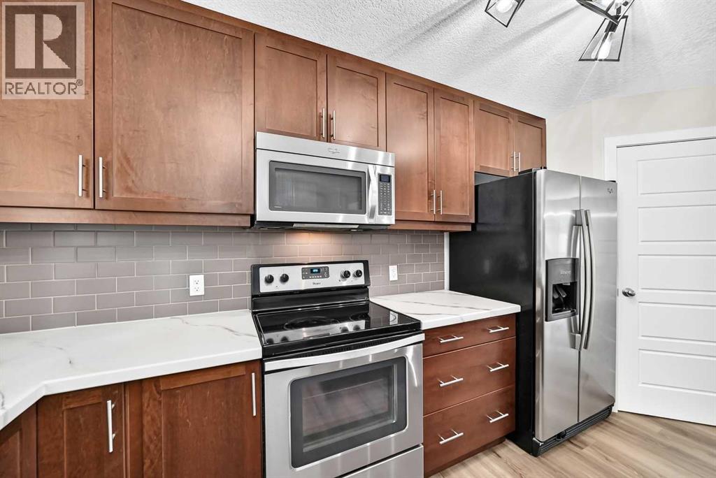 86 Pantego Lane NW, Calgary, Alberta  T3K 0T1 - Photo 10 - A2338242