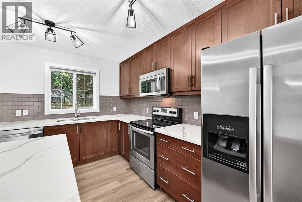 86 Pantego Lane NW, Calgary, Alberta  T3K 0T1 - Photo 7 - A2338242